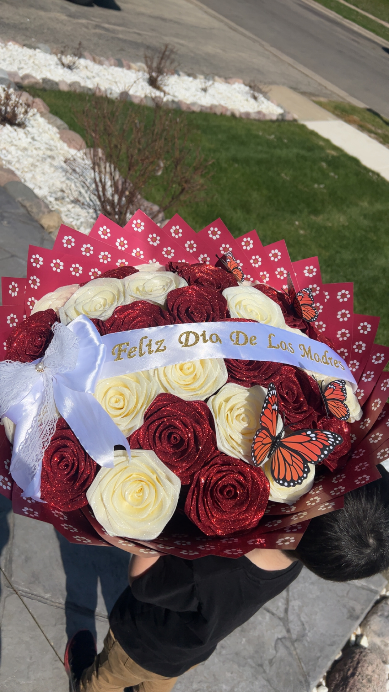 Red and cream rose bouquet with butterflies